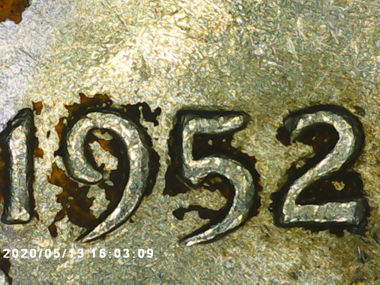 1952-Franklin-Half-Dollar:-What-Is-The-Crack-On-His-Face?-Does-It-Change-The-Value?